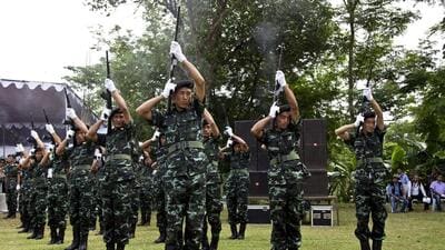 Soldiers of the NSCN (IM) give a gun salute to their chairman Isak Chishi Swu during state funeral service at their headquarters in Hebron, Nagaland, on July 1, 2016. (AP FILE PHOTO) Soldiers of the NSCN (IM) give a gun salute to their chairman Isak Chishi Swu during state funeral service at their headquarters in Hebron, Nagaland, on July 1, 2016. (AP FILE PHOTO)