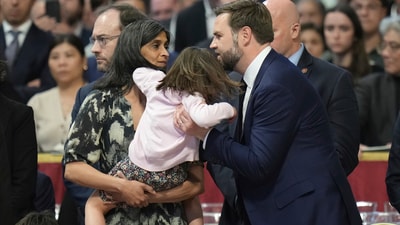 During the mass, Vice President JD Vance shared an adorable moment when he gently took his daughter from Usha's arms, offering to carry her throughout the ceremony. ((AP Photo/Alessandra Tarantino)) During the mass, Vice President JD Vance shared an adorable moment when he gently took his daughter from Usha's arms, offering to carry her throughout the ceremony. ((AP Photo/Alessandra Tarantino))