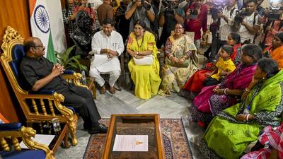 West Bengal Governor C V Ananda Bose meets people from violence hit Murshidabad, in Kolkata on Thursday. (PTI Photo) West Bengal Governor C V Ananda Bose meets people from violence hit Murshidabad, in Kolkata on Thursday. (PTI Photo)