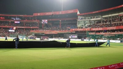 The match was curtailed to 14 overs a side due to rain which delayed the start by over two hours. Punjab Kings won the toss when it eventually took place and chose to bowl first. (BCCI) The match was curtailed to 14 overs a side due to rain which delayed the start by over two hours. Punjab Kings won the toss when it eventually took place and chose to bowl first. (BCCI)