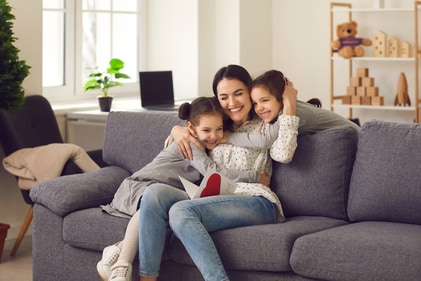 A twin who receives more hugs may grow up to be more cooperative and compassionate. (Shutterstock)