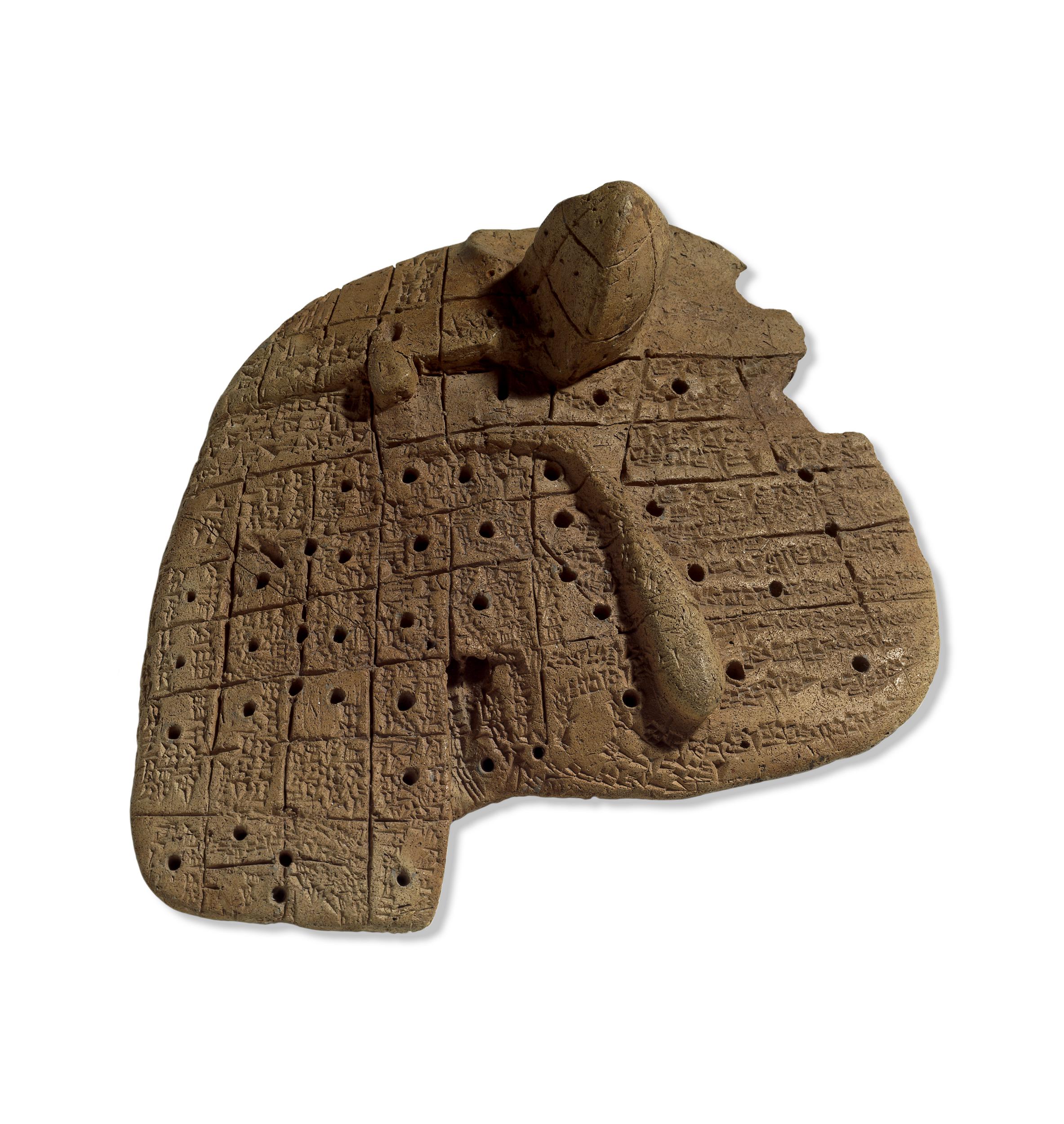 Cuneiform text on an ancient clay model of a sheep’s liver. Such models were used to teach divination methods in Ancient Babylon. (British Museum) Cuneiform text on an ancient clay model of a sheep’s liver. Such models were used to teach divination methods in Ancient Babylon. (British Museum)