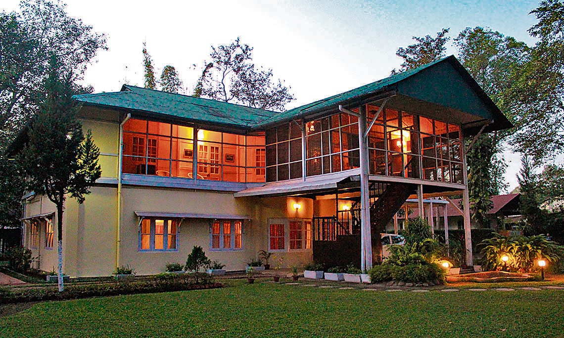 Chowkindinghee Bungalow, set within a tea plantation in Assam. (Wikimedia Commons) Chowkindinghee Bungalow, set within a tea plantation in Assam. (Wikimedia Commons)