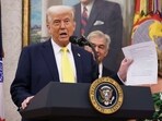 US President Donald Trump during a swearing-in ceremony for Mehmet Oz, administrator of the Centers for Medicare & Medicaid Services, in the Oval Office of the White House in Washington, DC, US, on Friday, April 18, 2025. The Senate confirmed surgeon and TV star Mehmet Oz to lead the agency on April 3.
