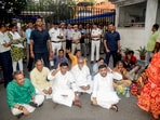 West Bengal BJP President and Union Minister Sukanta Majumdar, along with victims of Murshidabad violence, during a sit-in protest outside Bhawani Bhawan on April 16.
