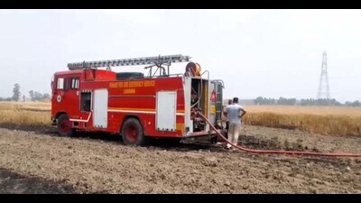 A fire engine in Chaunta village, Ludhiana, on Saturday. (HT Photo) A fire engine in Chaunta village, Ludhiana, on Saturday. (HT Photo)