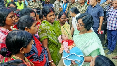 National Commission for Women (NCW) Chairperson Vijaya Rahatkar meets the families affected by the Murshidabad violence at a shelter home, in Malda on Friday. (Vijaya Rahatkar-X) National Commission for Women (NCW) Chairperson Vijaya Rahatkar meets the families affected by the Murshidabad violence at a shelter home, in Malda on Friday. (Vijaya Rahatkar-X)