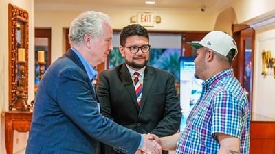 US Senator Chris Van Hollen (L) shaking hands with Salvadoran migrant Kilmar Abrego Garcia (R), a US citizen wrongfully deported to his home country, at a hotel in San Salvador on April 17, 2025. (AFP) US Senator Chris Van Hollen (L) shaking hands with Salvadoran migrant Kilmar Abrego Garcia (R), a US citizen wrongfully deported to his home country, at a hotel in San Salvador on April 17, 2025. (AFP)