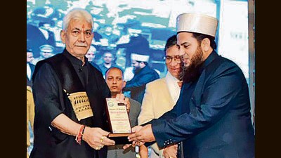 Jammu and Kashmir Lieutenant Governor Manoj Sinha being felicitated at a Sufi Conference, in Srinagar on Saturday. (ANI) Jammu and Kashmir Lieutenant Governor Manoj Sinha being felicitated at a Sufi Conference, in Srinagar on Saturday. (ANI)