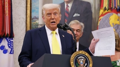US President Donald Trump during a swearing-in ceremony for Mehmet Oz, administrator of the Centers for Medicare & Medicaid Services, in the Oval Office of the White House in Washington, DC, US, on Friday, April 18, 2025. The Senate confirmed surgeon and TV star Mehmet Oz to lead the agency on April 3. (Bloomberg) US President Donald Trump during a swearing-in ceremony for Mehmet Oz, administrator of the Centers for Medicare & Medicaid Services, in the Oval Office of the White House in Washington, DC, US, on Friday, April 18, 2025. The Senate confirmed surgeon and TV star Mehmet Oz to lead the agency on April 3. (Bloomberg)
