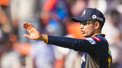 Gujarat Titans' captain Shubman Gill sets the field during a match. (PTI) Gujarat Titans' captain Shubman Gill sets the field during a match. (PTI)