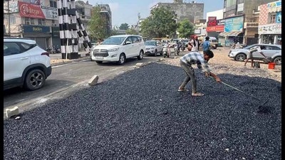 Road repair work underway in Model Town, Ludhiana, on Saturday. (HT Photo) Road repair work underway in Model Town, Ludhiana, on Saturday. (HT Photo)