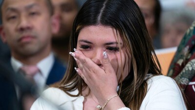 Jennifer Vasquez Sura wipes a tear from her face as she attends press conference of Sen. Chris Van Hollen upon his arrival from meeting with her husband, Kilmar Abrego Garcia, in El Salvador, at Washington Dulles International Airport. (AP) Jennifer Vasquez Sura wipes a tear from her face as she attends press conference of Sen. Chris Van Hollen upon his arrival from meeting with her husband, Kilmar Abrego Garcia, in El Salvador, at Washington Dulles International Airport. (AP)