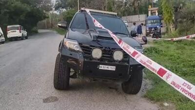 The car in which Ricky Rai, son of former underworld operative Muthappa Rai, was travelling in, damaged after an armed gang opened fire at him, at Bidadi near Bengaluru, on Saturday (PTI) The car in which Ricky Rai, son of former underworld operative Muthappa Rai, was travelling in, damaged after an armed gang opened fire at him, at Bidadi near Bengaluru, on Saturday (PTI)