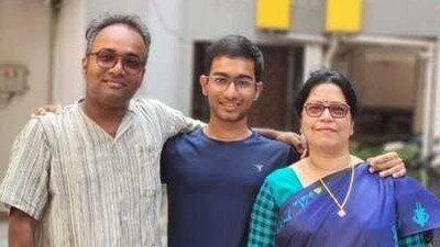 Archisman in the middle with his parents Archisman in the middle with his parents