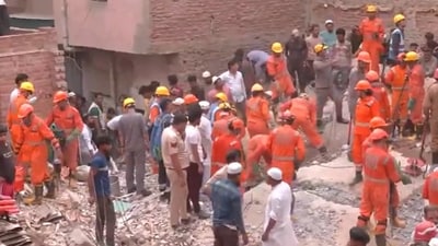 National Disaster Response Force (NDRF) and police teams were at the spot to carry out a rescue operation on Saturday morning. (ANI) National Disaster Response Force (NDRF) and police teams were at the spot to carry out a rescue operation on Saturday morning. (ANI)