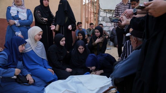 Palestinians mourn over the body of Kinan Edwan, 2 years old, killed in an Israeli army airstrike, during his funeral in Khan Younis, southern Gaza Strip, Saturday, April 19, 2025. (AP)