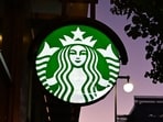 Starbucks will have several locations open on Easter, although hours may vary. (Photo by Frederic J. BROWN / AFP)