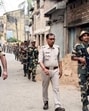 Security personnel keep vigil in Murshidabad on Sunday. (PTI)