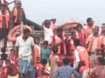 Security personnel escorted people on boats from Malda to Dhuliyan after the Murshidabad violence was under control