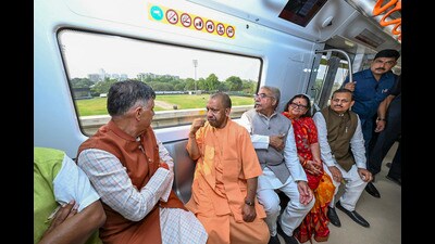 Chief minister Yogi Adityanath takes a metro ride from Nayaganj station to Rawatpur station, in Kanpur on Sunday. (@CMOfficeUP)