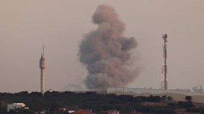 Smoke rises from Gaza after an air strike, as seen from the Israeli side of the border. (Reuters )