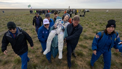 NASA astronaut Don Pettit gestures as he is carried to a medical tent shortly after landing in a Soyuz MS-26 spacecraft with Roscosmos cosmonauts Alexey Ovchinin and Ivan Vagner near the town of Zhezkazgan, Kazakhstan, on Sunday, April 20, 2025. (AP) NASA astronaut Don Pettit gestures as he is carried to a medical tent shortly after landing in a Soyuz MS-26 spacecraft with Roscosmos cosmonauts Alexey Ovchinin and Ivan Vagner near the town of Zhezkazgan, Kazakhstan, on Sunday, April 20, 2025. (AP)