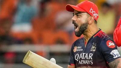 Virat Kohli celebrates the winning runs hit by Jitesh Sharma, against Jitesh's former team. (PTI) Virat Kohli celebrates the winning runs hit by Jitesh Sharma, against Jitesh's former team. (PTI)