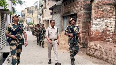 Security personnel keep vigil in Murshidabad on Sunday. (PTI) Security personnel keep vigil in Murshidabad on Sunday. (PTI)