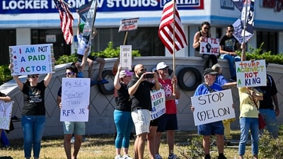 Demonstrators rally against Trump and join forces during a protest organised by the 50501 Movement on April 19, 2025, in Cocoa, Florida. (Getty Images via AFP) Demonstrators rally against Trump and join forces during a protest organised by the 50501 Movement on April 19, 2025, in Cocoa, Florida. (Getty Images via AFP)