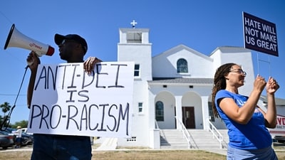 Across states, people gathered in large numbers signs and placards targeting the US president with slogans. In pic:Demonstrators rally against Trump and join forces during a protest organized by the 50501 Movement on April 19, 202. (Getty Images via AFP) Across states, people gathered in large numbers signs and placards targeting the US president with slogans. In pic:Demonstrators rally against Trump and join forces during a protest organized by the 50501 Movement on April 19, 202. (Getty Images via AFP)