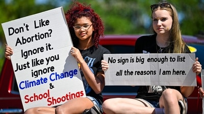 Protesters in Philadelphia and at state capitols in California, Minnesota, Michigan, Texas, Wisconsin, Indiana and beyond waved signs denouncing President Donald Trump; billionaire Elon Musk, the leader of Trump’s new Department of Government Efficiency (DOGE). (Getty Images via AFP) Protesters in Philadelphia and at state capitols in California, Minnesota, Michigan, Texas, Wisconsin, Indiana and beyond waved signs denouncing President Donald Trump; billionaire Elon Musk, the leader of Trump’s new Department of Government Efficiency (DOGE). (Getty Images via AFP)