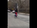 A man in New York City was spotted cycling with a fridge on his head. A man in New York City was spotted cycling with a fridge on his head.