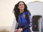 This handout photo from Blue Origin shows US singer Katy Perry upon return to Earth after a flight on Blue Origin New Shepard NS-31, which brought the passengers beyond the Karman line -- the internationally recognized boundary of space, in Van Horn, West Texas, April 14, 2025. Pop star Katy Perry completed a brief foray into space Monday, roaring to the edge of the cosmos with an all-women crew on one of billionaire Jeff Bezos's rockets. The "Firework" and "California Gurls" singer was lofted more than 60 miles (100 kilometers) above the Earth's surface in a vessel from Blue Origin, the space company owned by the Amazon founder. Five other women -- including Bezos's fiancee Lauren Sanchez -- were on the flight, which took off from western Texas shortly after 8:30 am (1330 GMT) before safely landing again some (Photo by Handout / BLUE ORIGIN / AFP) / RESTRICTED TO EDITORIAL USE - MANDATORY CREDIT "AFP PHOTO / HANDOUT / BLUE ORIGIN " - NO MARKETING NO ADVERTISING CAMPAIGNS - DISTRIBUTED AS A SERVICE TO CLIENTS This handout photo from Blue Origin shows US singer Katy Perry upon return to Earth after a flight on Blue Origin New Shepard NS-31, which brought the passengers beyond the Karman line -- the internationally recognized boundary of space, in Van Horn, West Texas, April 14, 2025. Pop star Katy Perry completed a brief foray into space Monday, roaring to the edge of the cosmos with an all-women crew on one of billionaire Jeff Bezos's rockets. The "Firework" and "California Gurls" singer was lofted more than 60 miles (100 kilometers) above the Earth's surface in a vessel from Blue Origin, the space company owned by the Amazon founder. Five other women -- including Bezos's fiancee Lauren Sanchez -- were on the flight, which took off from western Texas shortly after 8:30 am (1330 GMT) before safely landing again some (Photo by Handout / BLUE ORIGIN / AFP) / RESTRICTED TO EDITORIAL USE - MANDATORY CREDIT "AFP PHOTO / HANDOUT / BLUE ORIGIN " - NO MARKETING NO ADVERTISING CAMPAIGNS - DISTRIBUTED AS A SERVICE TO CLIENTS