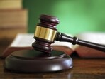 Gavel and law books () Gavel and law books ()