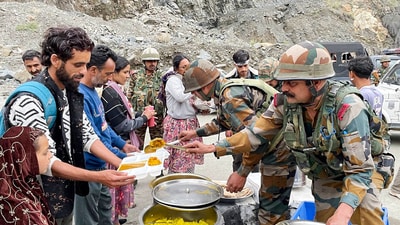 Army personnel also distributed food to stranded passengers affected by the landslide, which was triggered by heavy rains and hailstorm in Ramban, (ANI) Army personnel also distributed food to stranded passengers affected by the landslide, which was triggered by heavy rains and hailstorm in Ramban, (ANI)