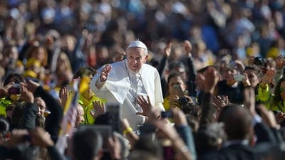 Pope Francis salutes the crowd as he arrives for his general audience in St Peter's square at the Vatican on November 6, 2013. (AFP) Pope Francis salutes the crowd as he arrives for his general audience in St Peter's square at the Vatican on November 6, 2013. (AFP)