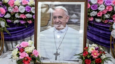 A portrait of Pope Francis is pictured during a condolence meeting in New Delhi on April 21, 2025, following the news of his death. (Photo by Sajjad HUSSAIN / AFP) (AFP)