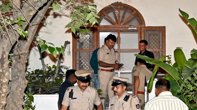 Police personnel investigate after former Karnataka Director General of Police Om Prakash was found dead at his residence in Bengaluru, Sunday night, April 20, 2025. (PTI) Police personnel investigate after former Karnataka Director General of Police Om Prakash was found dead at his residence in Bengaluru, Sunday night, April 20, 2025. (PTI)