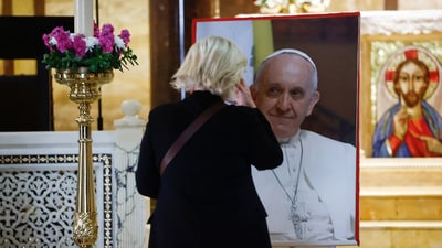 A Christian stands in front of an image of Pope Francis, after his death was announced by the Vatican, at Chiesa di Santa Maria Addolorata, also known as Church of the Argentines, in Rome, Italy, April 21, 2025. REUTERS/Vincenzo Livieri (REUTERS)