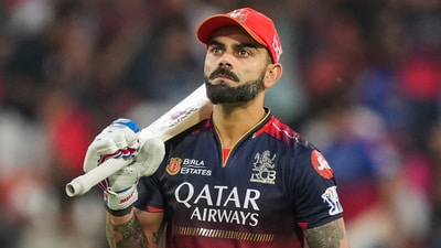 Virat Kohli celebrates his half century during the IPL 2025 match between Punjab Kings and Royal Challengers Bengaluru (PTI)