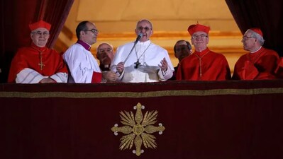 Newly elected Pope Francis I speaks to the waiting crowd from the central balcony of St. Peter's Basilica on March 13, 2013, in Vatican City. Peter Macdiarmid/Getty Images 