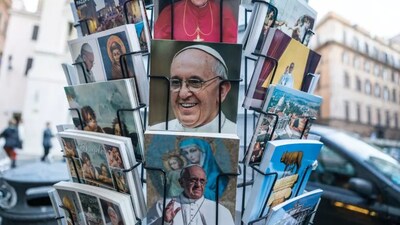 Pope Francis and Pope Benedict XVI postcards and souvenirs in the center of Rome on March 9, 2014. piola666/Getty Images 