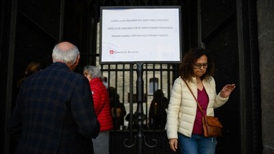 A sign indicating the prayer chapel for Pope Francis is seen at the Chapel of Saint Lucia in Barcelona's cathedral, on April 21, 2025. Pope Francis died on April 21, 2025 aged 88, a day after making a much hoped-for appearance at Saint Peter's Square on Easter Sunday, the Vatican said in a statement. (Photo by Josep LAGO / AFP) (AFP) A sign indicating the prayer chapel for Pope Francis is seen at the Chapel of Saint Lucia in Barcelona's cathedral, on April 21, 2025. Pope Francis died on April 21, 2025 aged 88, a day after making a much hoped-for appearance at Saint Peter's Square on Easter Sunday, the Vatican said in a statement. (Photo by Josep LAGO / AFP) (AFP)