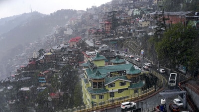 Himachal Pradesh: Vehicle ply on roads amid rains in Shimla. (PTI photo) Himachal Pradesh: Vehicle ply on roads amid rains in Shimla. (PTI photo)