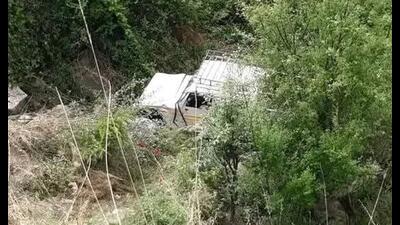 The Bolero Camper after it plunged into the gorge in Dodra Kwar region of Shimla district on Monday. (HT Photo)