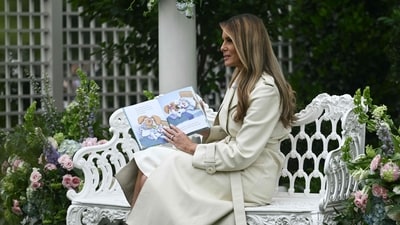 US First Lady Melania Trump reads a book to children and guests during the annual Easter Egg Roll on the South Lawn of the White House on April 21, 2025, in Washington, DC. (AFP) US First Lady Melania Trump reads a book to children and guests during the annual Easter Egg Roll on the South Lawn of the White House on April 21, 2025, in Washington, DC. (AFP)