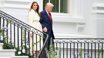 US President Donald Trump and First Lady Melania Trump walk down the stairs from the Blue Room Balcony to the South Lawn as they host the annual Easter Egg Roll at the White House on April 21, 2025, in Washington, DC. According to the US National Park Service, the egg roll tradition dates back to 1878 when President Rutherford B. Hayes invited children to roll Easter eggs on the White House grounds. Children previously rolled eggs down a hill at the US Capitol in the early 1870s, but a law was passed in 1876 forbidding the Capitol property from being used due to the toll on the lawn. (Photo by Mandel NGAN / AFP) (AFP) US President Donald Trump and First Lady Melania Trump walk down the stairs from the Blue Room Balcony to the South Lawn as they host the annual Easter Egg Roll at the White House on April 21, 2025, in Washington, DC. According to the US National Park Service, the egg roll tradition dates back to 1878 when President Rutherford B. Hayes invited children to roll Easter eggs on the White House grounds. Children previously rolled eggs down a hill at the US Capitol in the early 1870s, but a law was passed in 1876 forbidding the Capitol property from being used due to the toll on the lawn. (Photo by Mandel NGAN / AFP) (AFP)