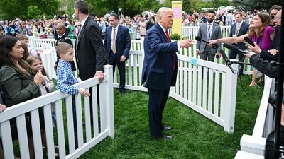 US President Donald Trump speaks to reporters as he hosts the annual Easter Egg Roll on the South Lawn of the White House on April 21, 2025, in Washington, DC. According to the US National Park Service, the egg roll tradition dates back to 1878 when President Rutherford B. Hayes invited children to roll Easter eggs on the White House grounds. Children previously rolled eggs down a hill at the US Capitol in the early 1870s, but a law was passed in 1876 forbidding the Capitol property from being used due to the toll on the lawn. (Photo by Mandel NGAN / AFP) (AFP) US President Donald Trump speaks to reporters as he hosts the annual Easter Egg Roll on the South Lawn of the White House on April 21, 2025, in Washington, DC. According to the US National Park Service, the egg roll tradition dates back to 1878 when President Rutherford B. Hayes invited children to roll Easter eggs on the White House grounds. Children previously rolled eggs down a hill at the US Capitol in the early 1870s, but a law was passed in 1876 forbidding the Capitol property from being used due to the toll on the lawn. (Photo by Mandel NGAN / AFP) (AFP)