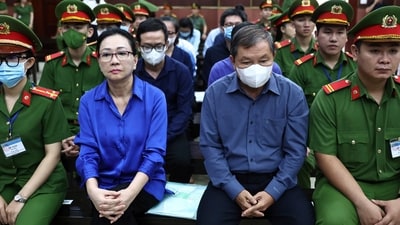 Vietnamese real estate tycoon Truong My Lan, second left, has had her life sentence for financial fraud and money laundering reduced to 30 years on appeal, in part due to the recovery of stolen funds, state media outlets reported on April 21. (Tran Quynh/VNExpress via AP) (AP) Vietnamese real estate tycoon Truong My Lan, second left, has had her life sentence for financial fraud and money laundering reduced to 30 years on appeal, in part due to the recovery of stolen funds, state media outlets reported on April 21. (Tran Quynh/VNExpress via AP) (AP)